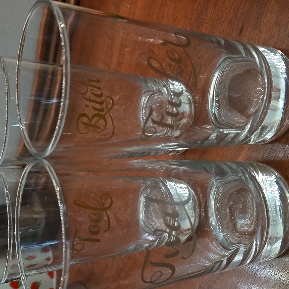 Set of 4 Clear Glasses with Gold Text